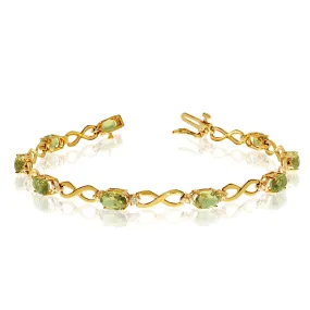 14K Yellow Gold Oval Peridot Stones And Diamonds Infinity Tennis Bracelet, 7"