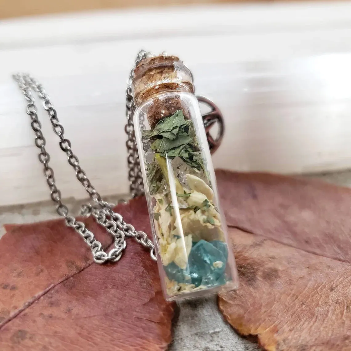 Calming grounding spell bottle necklace