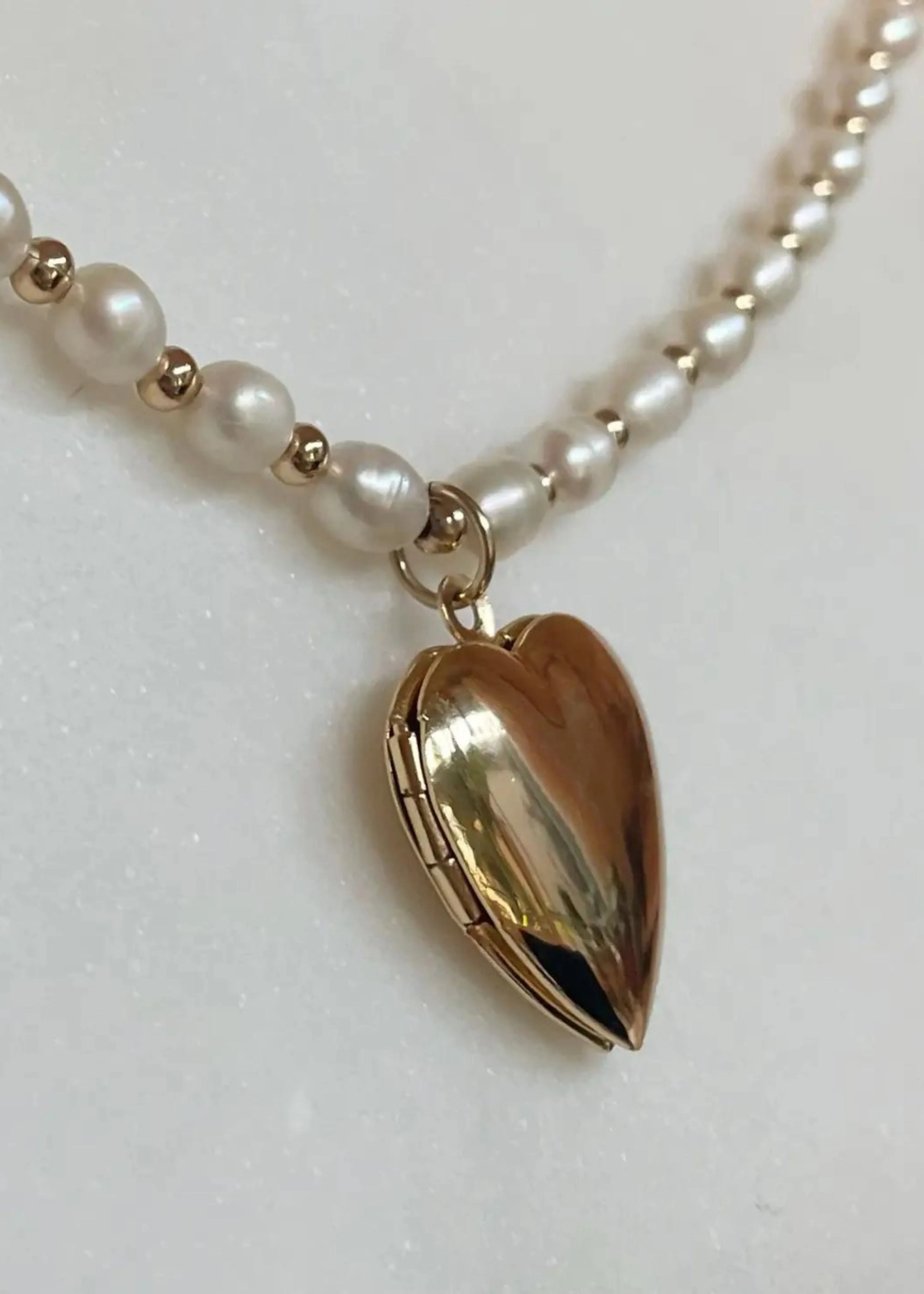 Heart of gold locket necklace