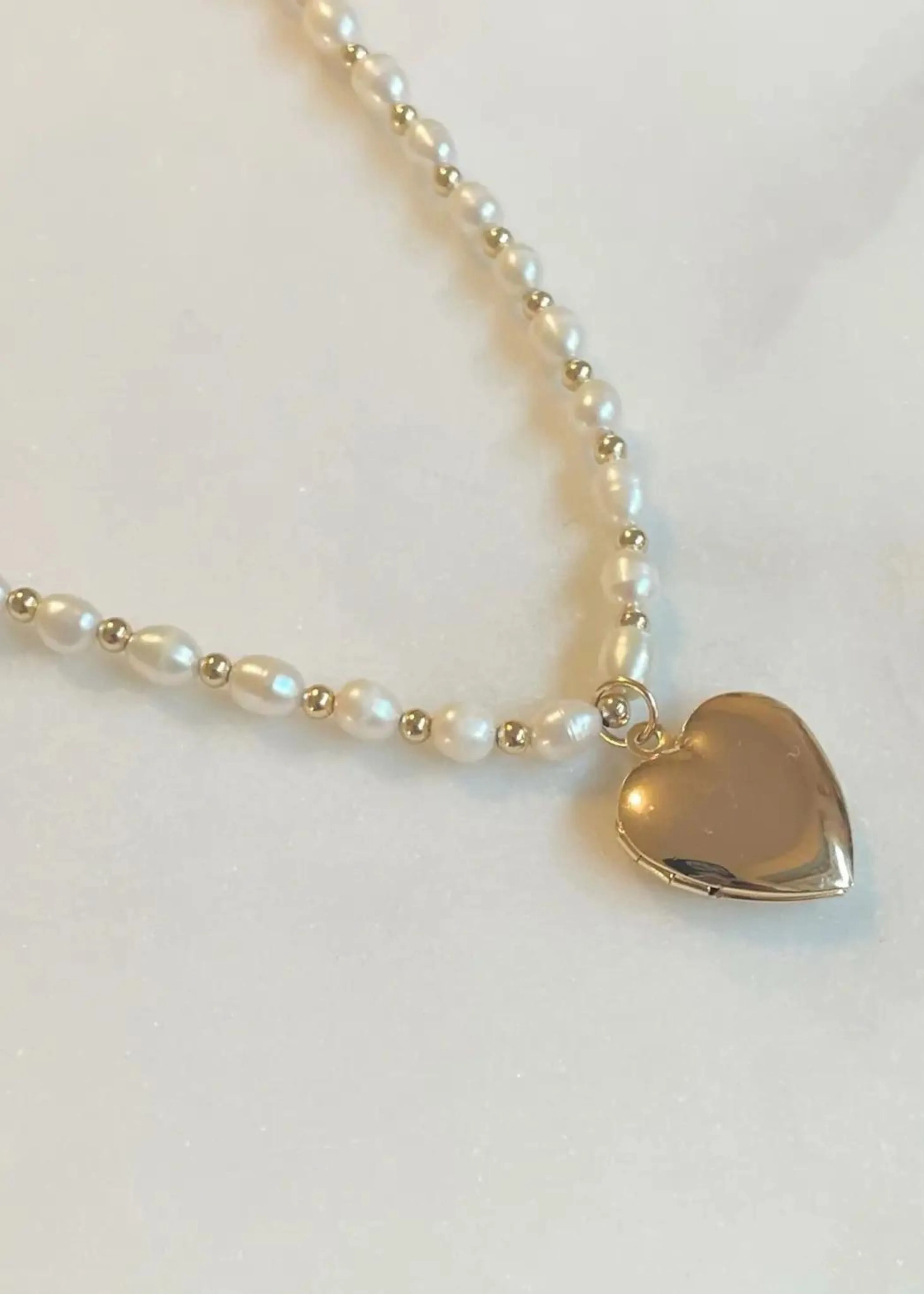 Heart of gold locket necklace