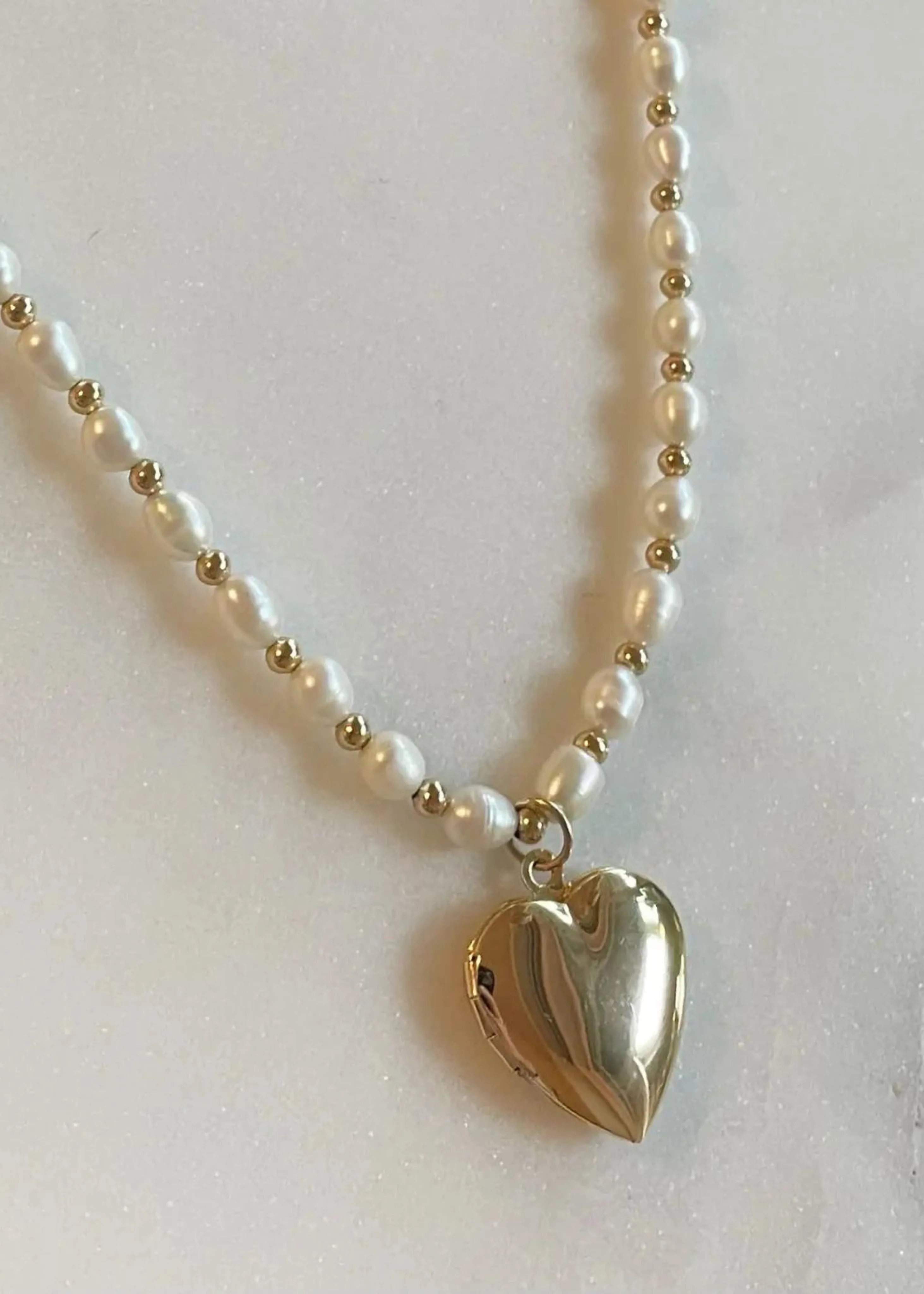 Heart of gold locket necklace