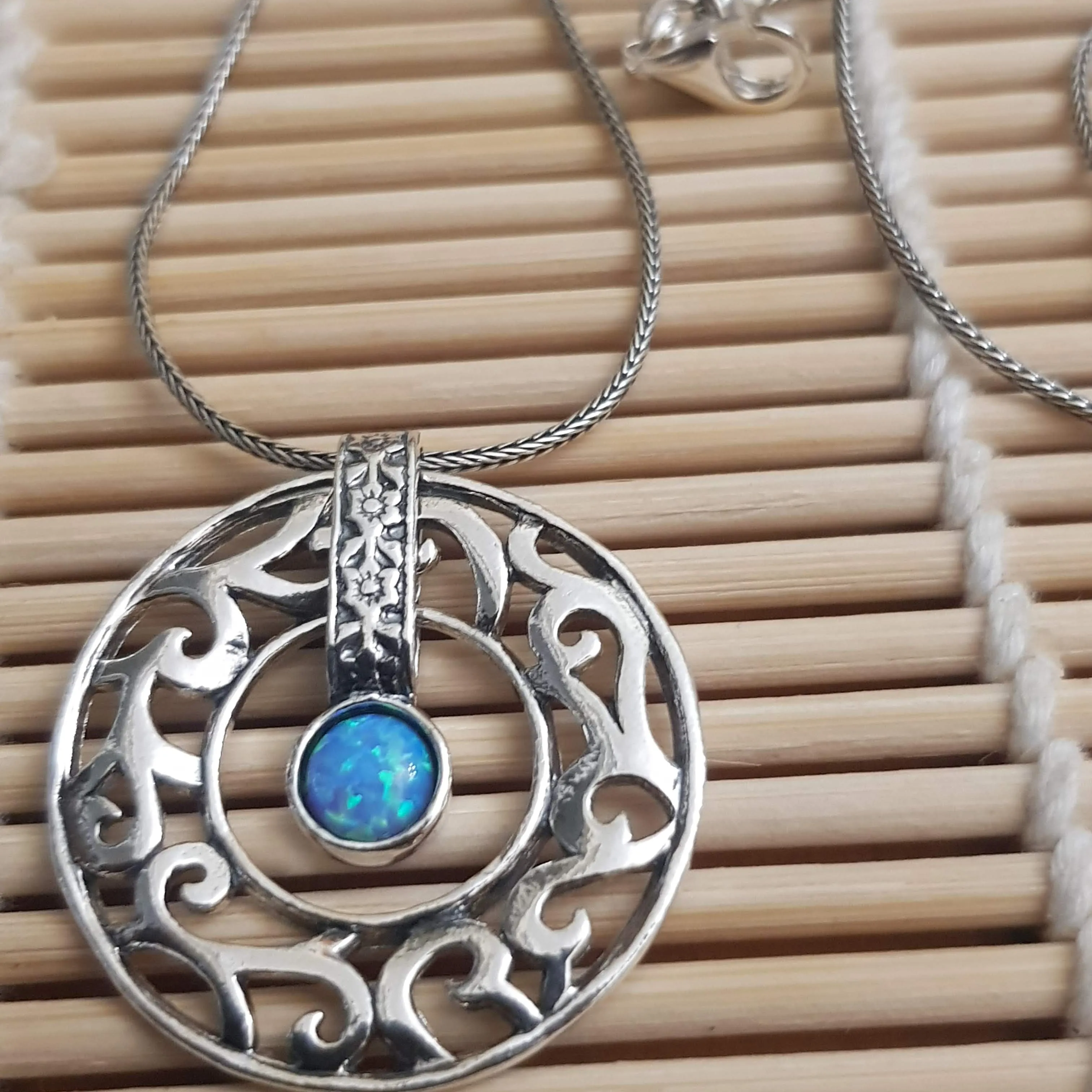 Israeli jewelry designer in silver necklace for women set with an opal / amethyst / garnet