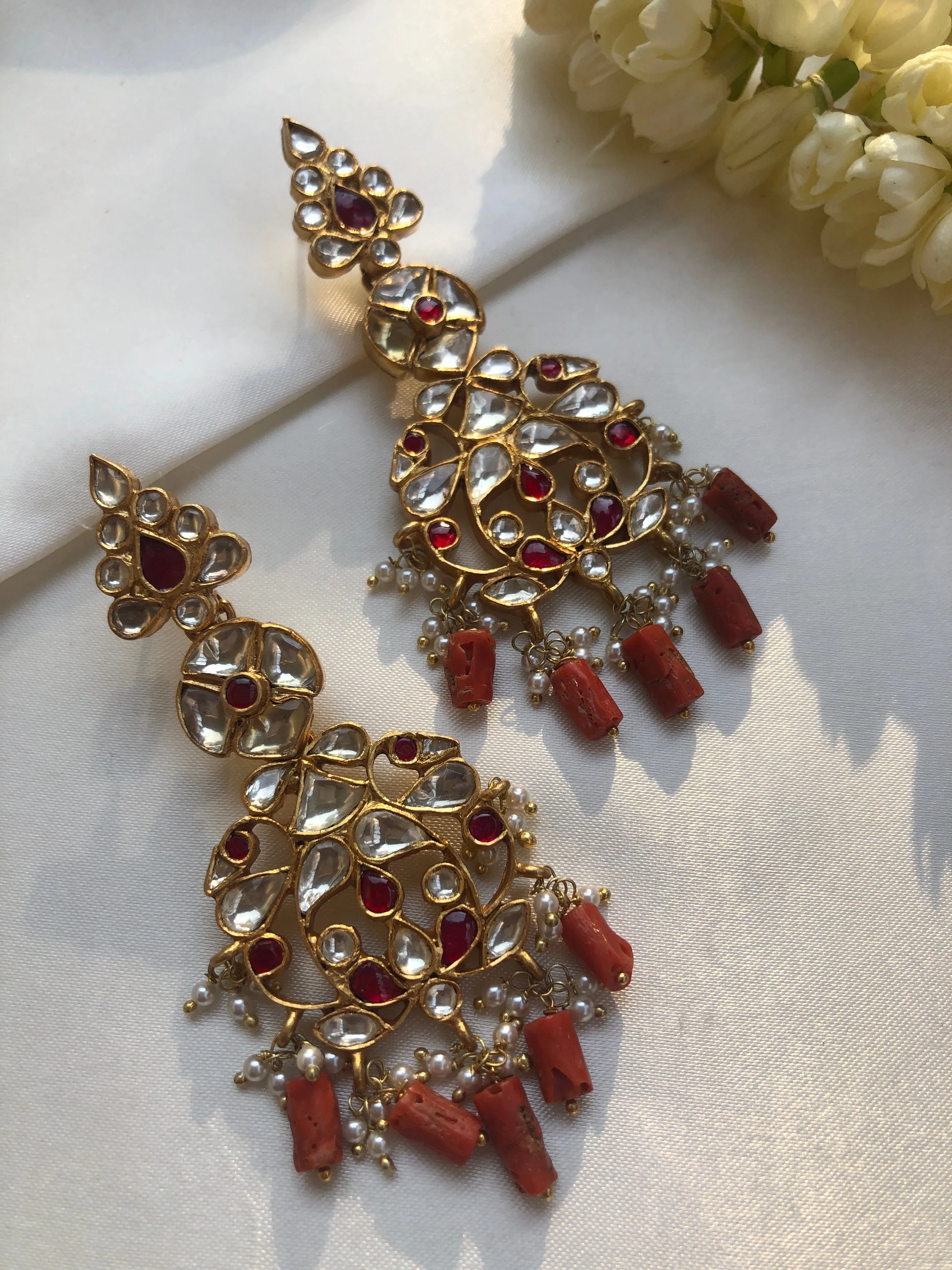 Kundan earrings with ruby and coral beads