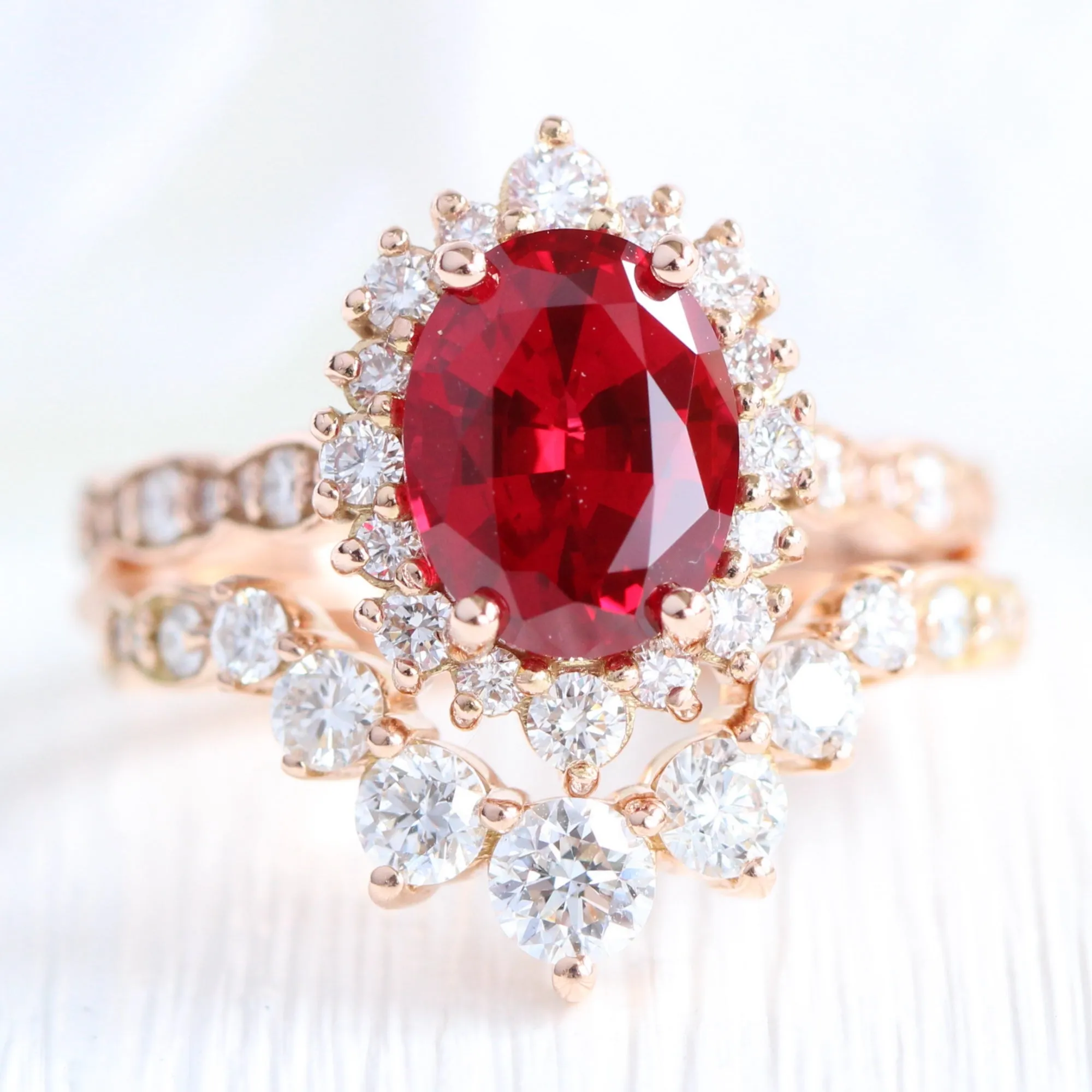 Large Oval Ruby Engagement Ring in Tiara Halo Diamond Scalloped Band