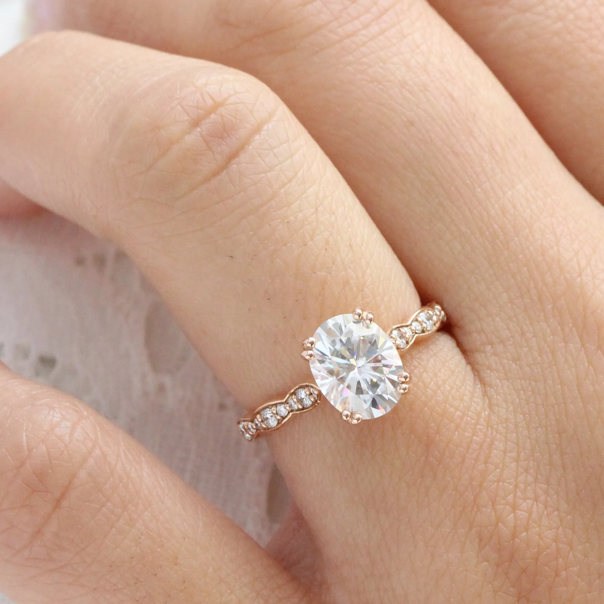 Oval Moissanite Engagement Ring in Grace Solitaire Diamond Band