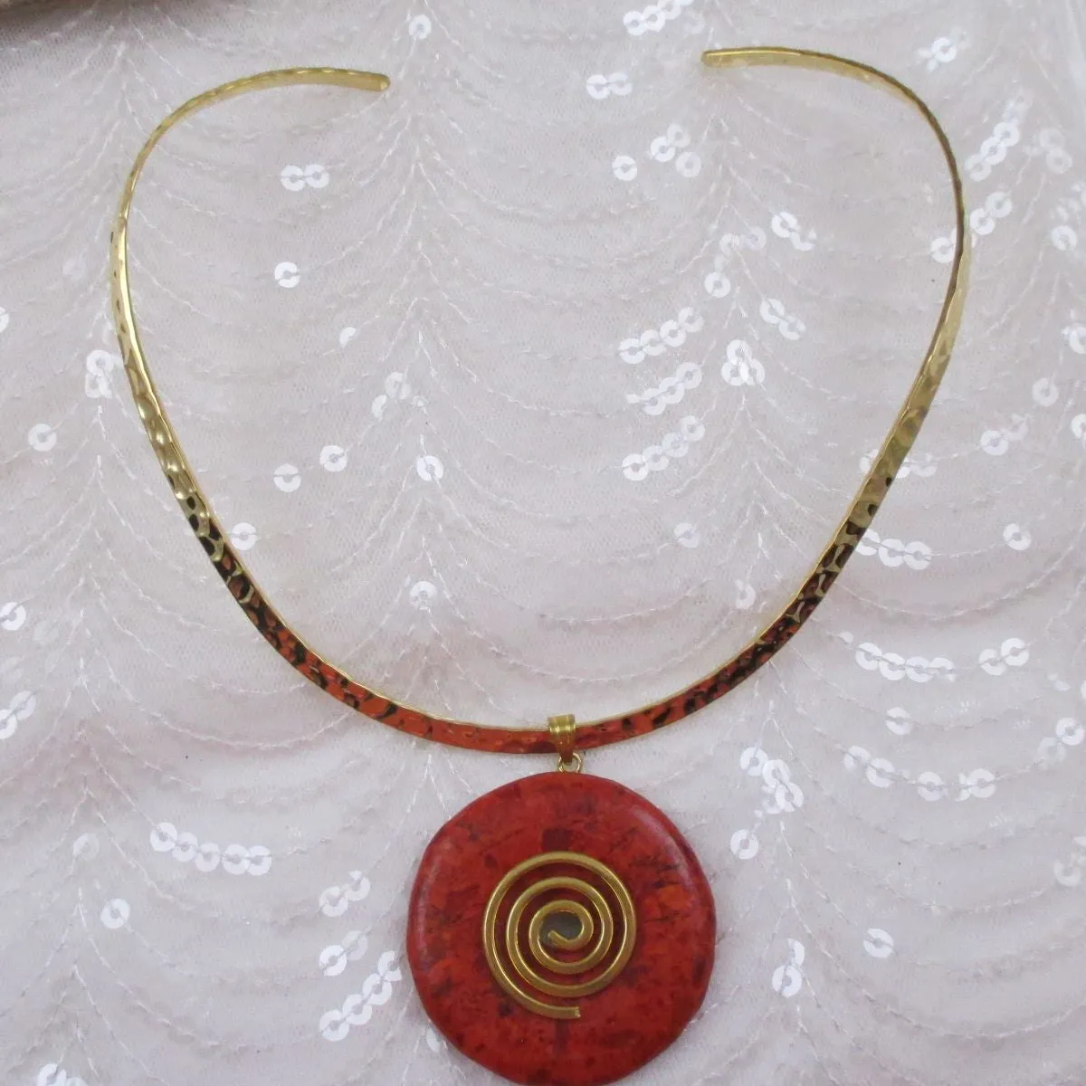 Red Gemstone Pendant on Gold Neck Wire