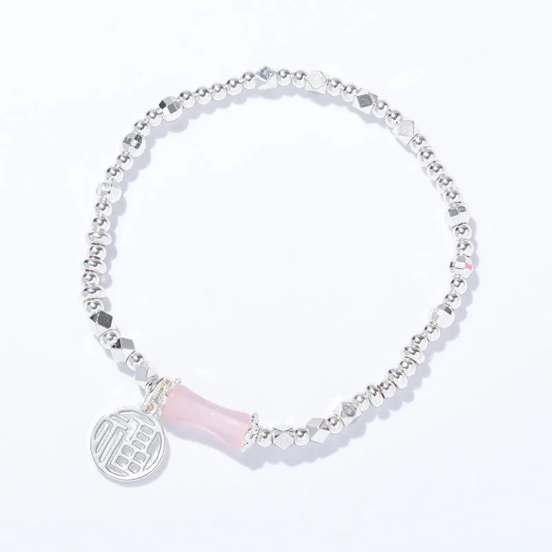 Retro Chinese Style Pink Quartz Crystal Bracelet with Sterling Silver and Fortune Bell Detail